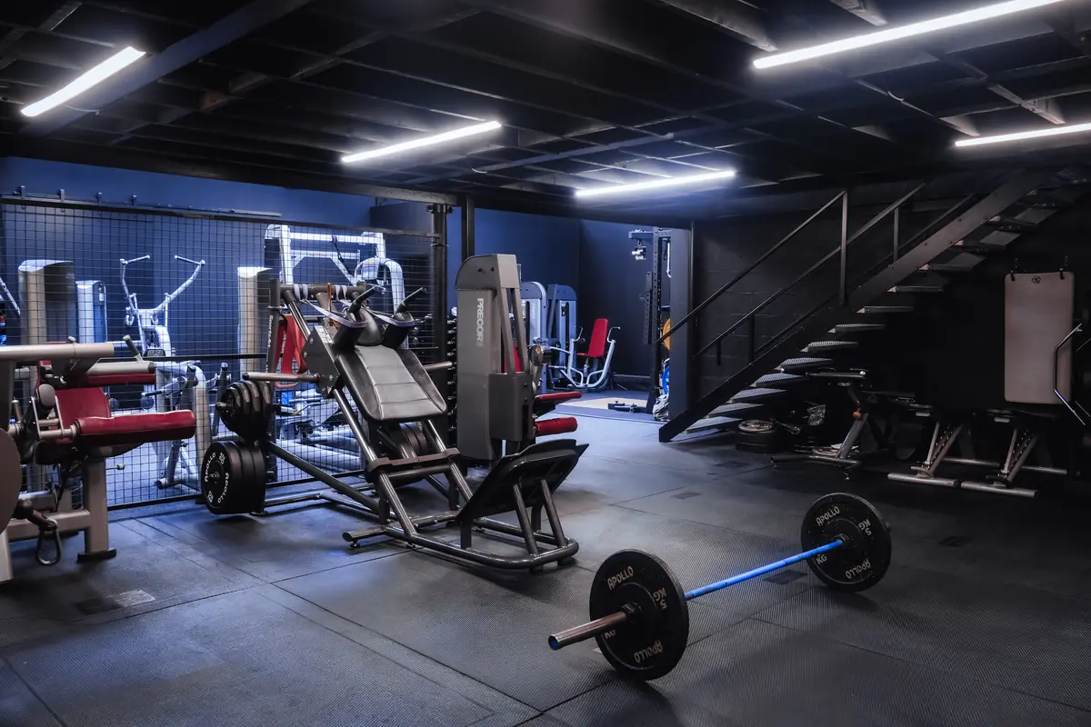 The strength floor at BodyMechanics, with the leg press and the rack